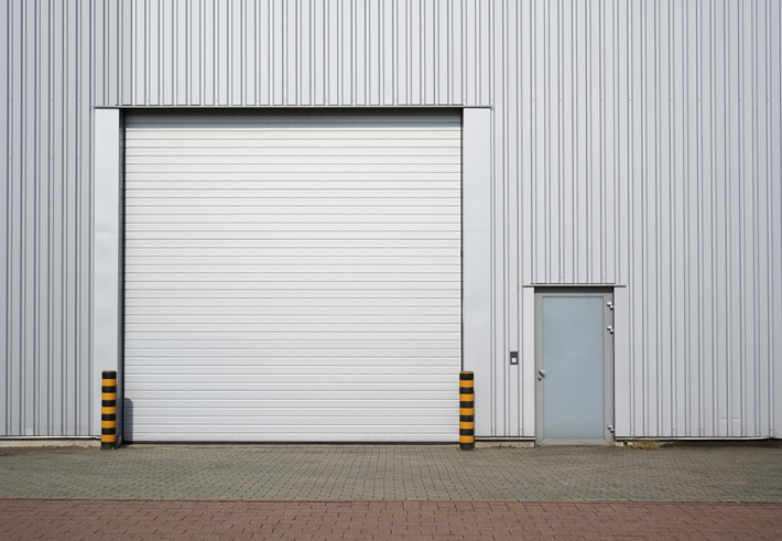 Top Reasons for Commercial Garage Door Spring Repairs